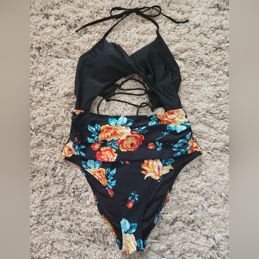 NEW, NEVER WORN One piece bathing suit